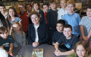 Photo of Kathy Gillespie with students